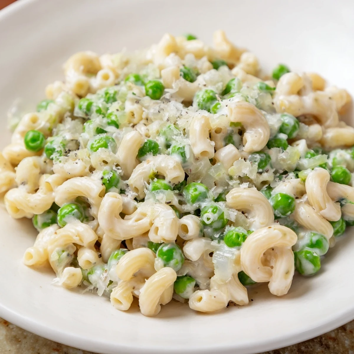 Macaroni & Peas served in a bowl, a classic comfort food perfect for a weeknight dinner.