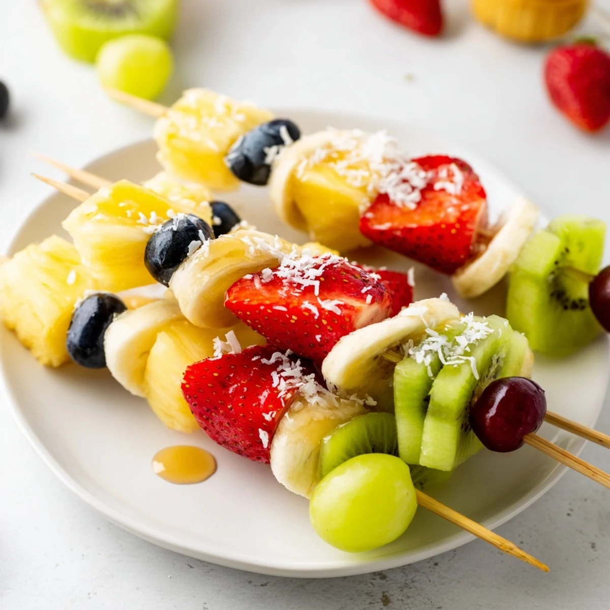 Vibrant Easy Festive Fruit Kabobs, juicy and colorful, are perfectly arranged on wooden skewers for a party.