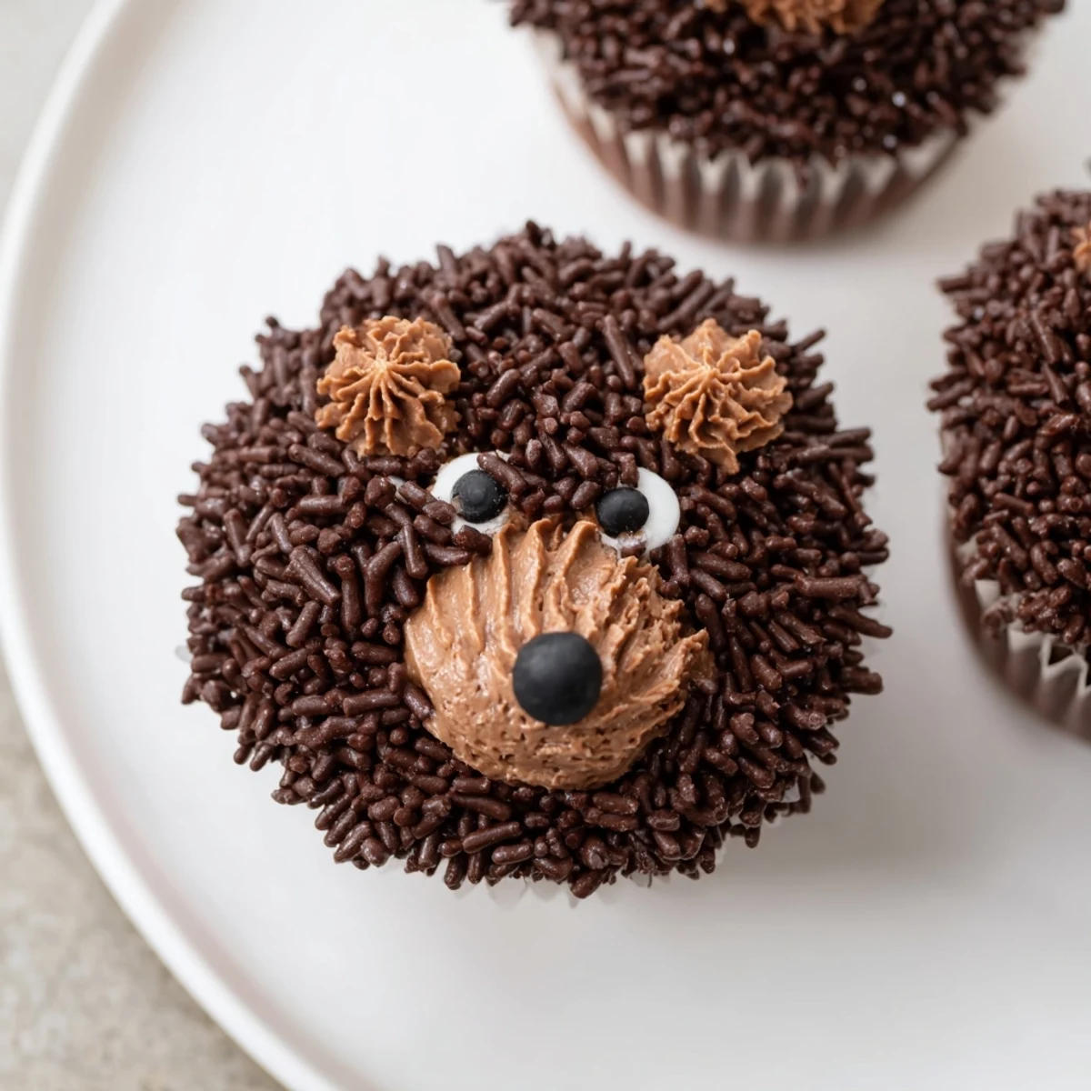 The chocolate buttercream frosted Hedgehog Cupcake Tower is a delightful dessert centerpiece for any celebration.