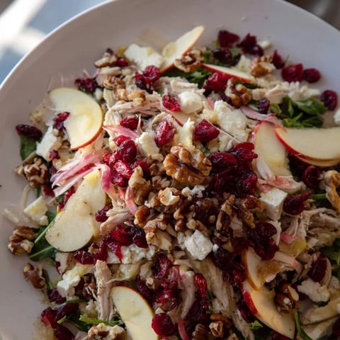 Chicken and Apple Winter Salad, a colorful mix of apples, chicken, and pecans, ready to enjoy.