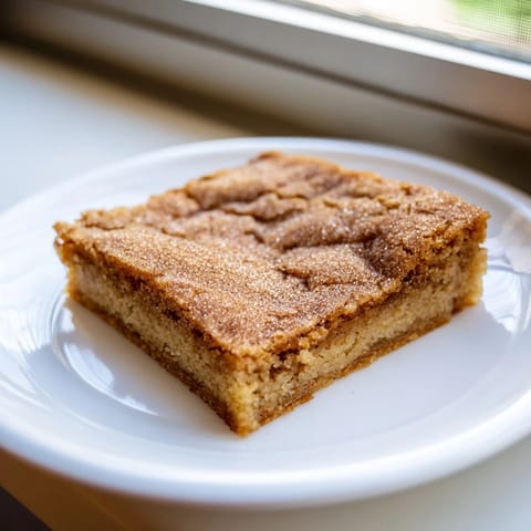 Delicious Cinnamon Sugar Sweet Tea Blondies, perfect alongside a warm cup of tea.  