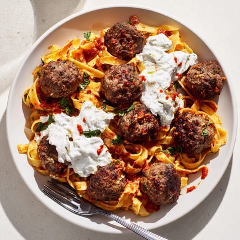 Savory beef meatballs and linguine burst with flavor in this Moroccan-Spiced Meatball Pasta.  