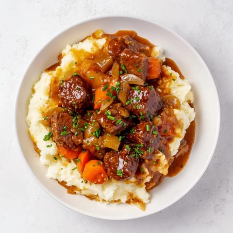 Hearty Fall Apple Cider Stew Mash, featuring fork-tender beef and a rich, savory cider sauce.