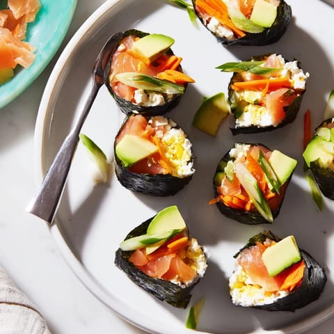 Close-up of a High-Protein Sushi Wrap Smoked Salmon Holiday Roll, showcasing layers of creamy cottage cheese and smoked fish.