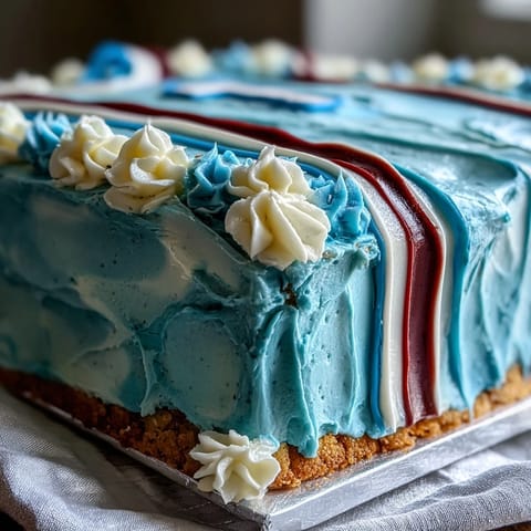 Festive graduation cake shaped like a sports jersey with bold team colors and personalized number, perfect for celebrating athletic achievements.