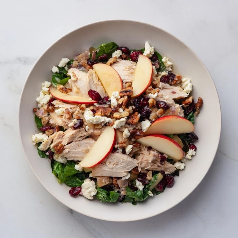 This gorgeous Chicken and Apple Winter Salad features glistening apple slices and tender chicken with pecans.